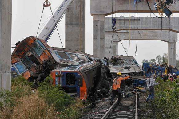 The wreckage after a construction crane fell into a passenger train in Nakhon Ratchasima province, Thailand, Wednesday, Jan.14, 2026. (AP Photo/Sakchai Lalit))
Thailand Train Accident