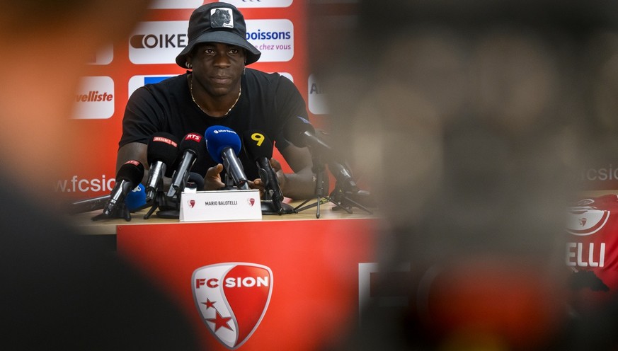 Mario Balotelli of Italy and new FC Sion soccer player, speaks during a press conference at the Stade de Tourbillon stadium, in Sion, Switzerland, Thursday, September 1, 2022. (KEYSTONE/Jean-Christoph ...