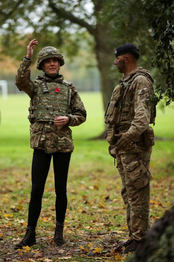 DEREHAM, ENGLAND - NOVEMBER 8: Catherine, Princess of Wales reacts as she visits The Queen's Dragoon Guards Regiment for the first time as their Colonel in Chief on November 8, 2023 in Dereham, E ...