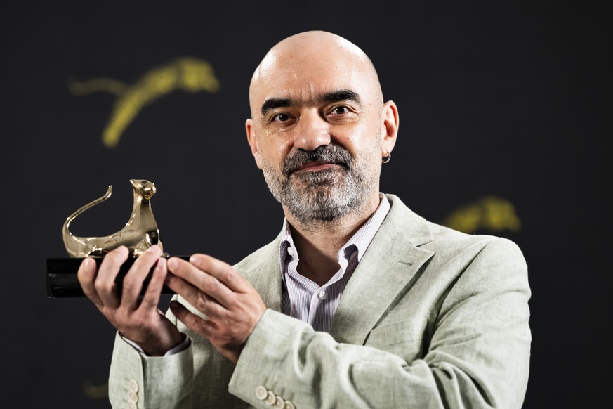 KEYPIX - Golden Leopard winner film director Florin Serban from Romania, poses with the award "Pardo d'Oro - Grand Prize of the Festival and City of Locarno" of the "Concorso Inter ...