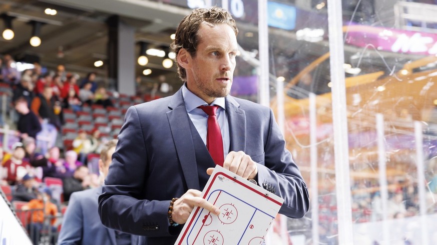 Patrick Fischer, head coach of Switzerland national ice hockey team, arrives for the second period, during the IIHF 2023 World Championship preliminary round group B game between Switzerland and Kazak ...