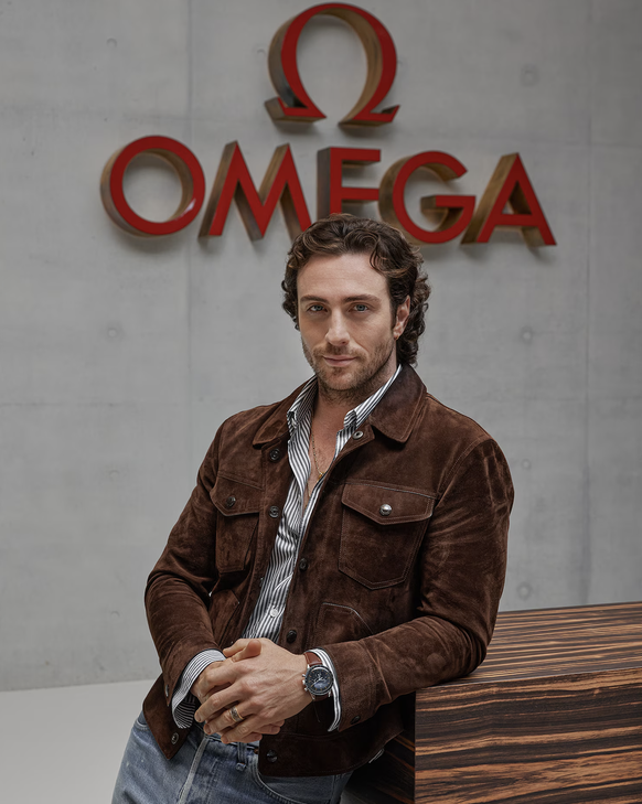 Après avoir rejoint Omega, l&#039;acteur Aaron Taylor-Johnson est pressenti pour endosser le costume de 007.