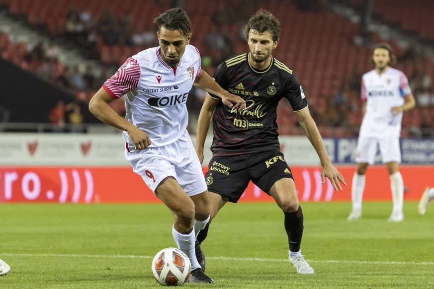 Sion&#039;s forward Ilyas Chouaref, left, controls the ball past Servette&#039;s midfielder Miroslav Stevanovic, right, during the Super League soccer match of Swiss Championship between FC Sion and F ...