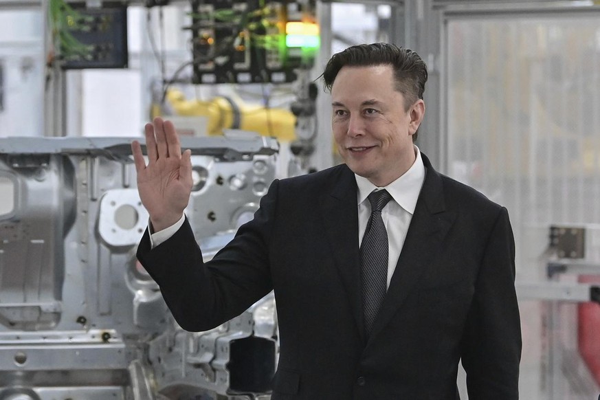 FILE - Tesla CEO Elon Musk attends the opening of the Tesla factory Berlin Brandenburg in Gruenheide, Germany, Tuesday, March 22, 2022. Elon Musk is taking a 9.2% stake in Twitter. Musk purchased appr ...