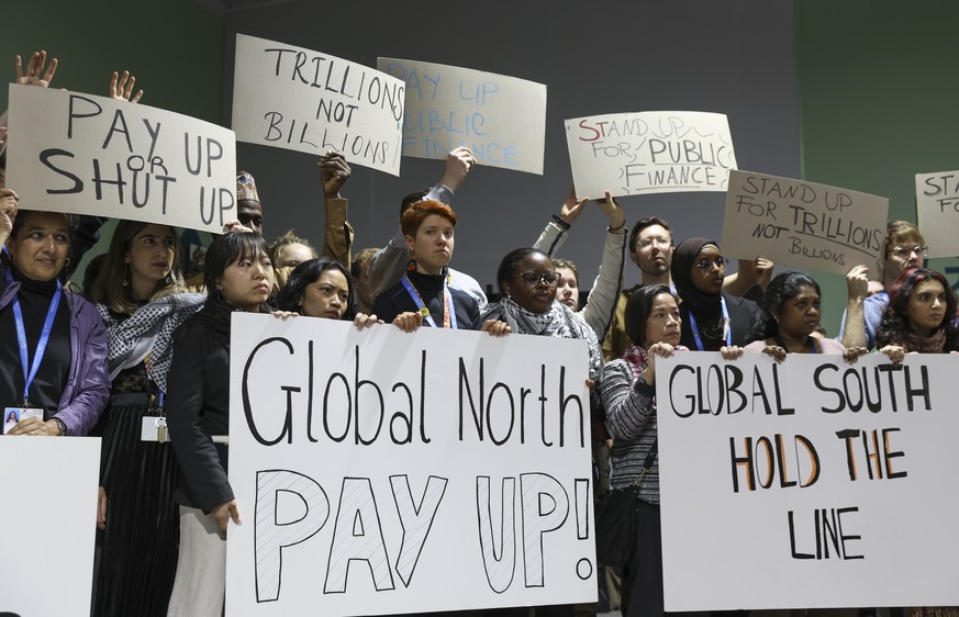 epa11737264 A handout picture made available by UN Climate Change shows climate activists attend a protest at the UN Climate Change Conference COP29 in Baku, Azerbaijan, 23 November 2024. EPA/COP29 AZ ...