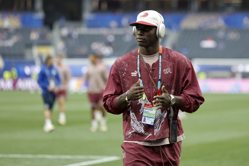 Switzerland's Breel Embolo gestures prior the World Cup Group B soccer match between Switzerland and Bosnia Herzegovina at the Los Angeles stadium in Inglewood, California, near Los Angeles, Thur ...