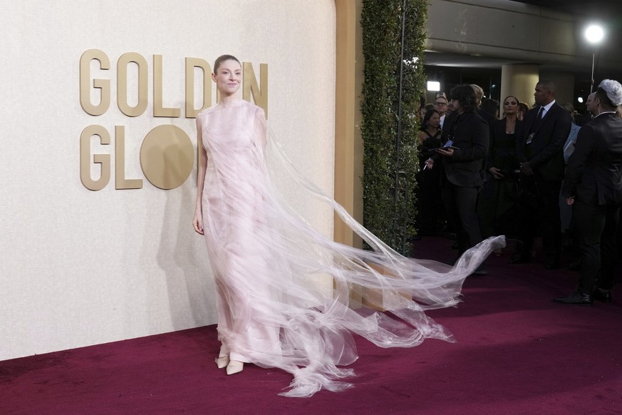 Hunter Schafer arrives at the 81st Golden Globe Awards on Sunday, Jan. 7, 2024, at the Beverly Hilton in Beverly Hills, Calif. (Photo by Jordan Strauss/Invision/AP)