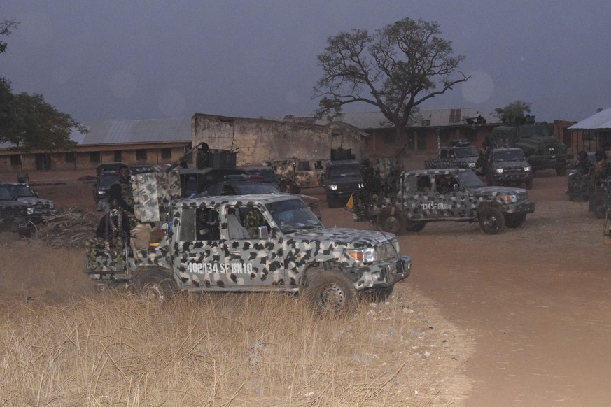 Nigeria army trucks are park in an area were gunmen kidnapped school children in Chikun, Nigeria, Thursday, March. 7, 2024. Gunmen attacked a school in Nigeria&#039;s northwest region Thursday morning ...