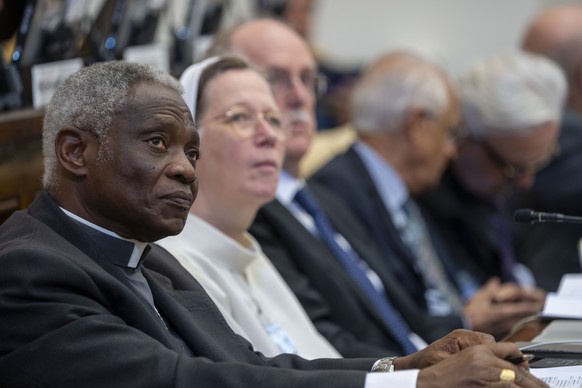 Chancellor of The Pontifical Academy of Sciences Cardinal Peter Turkson, left, and Academy President Sr. Helen Alford attend the opening session of the &quot;From Climate Crisis to Climate Resilience& ...