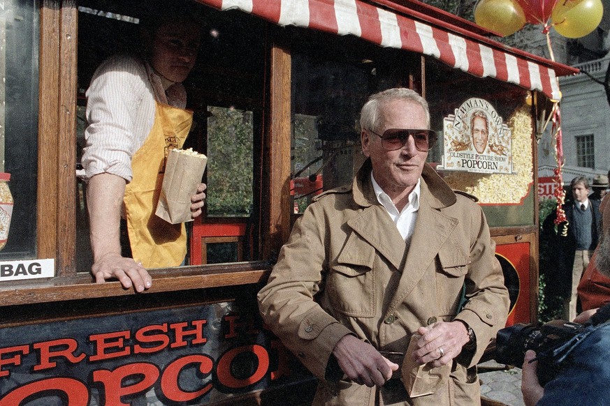 FILE �?? Paul Newman donates a popcorn stand to the City of New York, Nov. 15, 1984, for his &quot;Newman&#039;s Own Popcorn,&quot; with profits donated to charity. A new lawsuit filed Tuesday, Aug. 2 ...