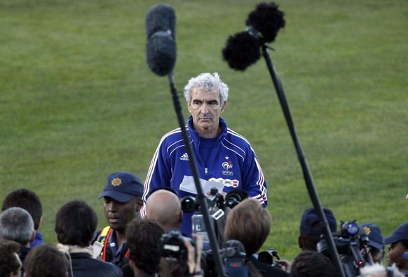 France soccer coach Raymond Domenech shows the letter of his players who decided to cancel the training session in Knysna, South Africa, Sunday, June 20, 2010. France&#039;s World Cup team refused to  ...