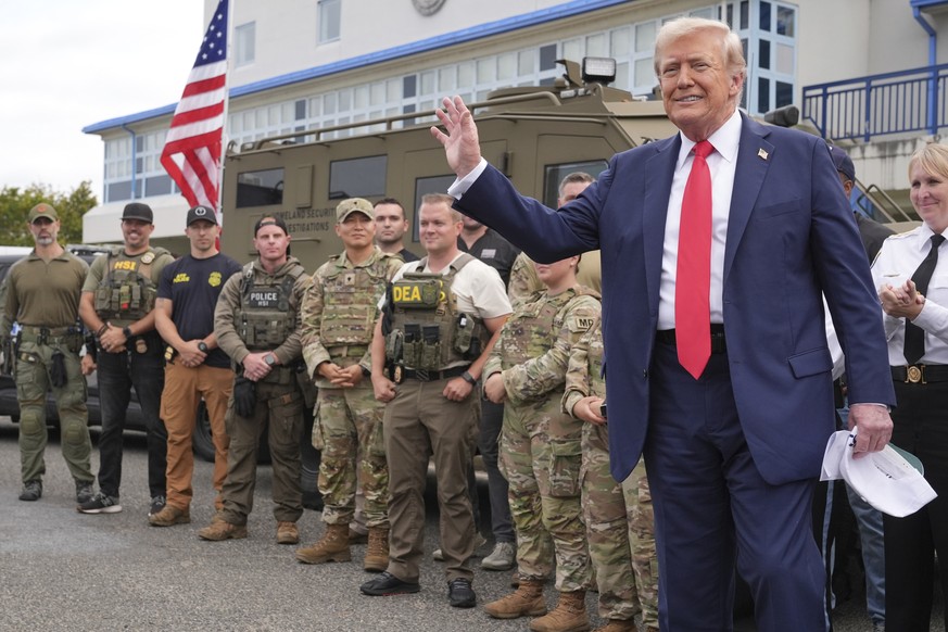 President Donald Trump speaks with members of law enforcement and National Guard soldiers, Thursday, Aug. 21, 2025, in Washington. (AP Photo/Jacquelyn Martin)
Trump District of Columbia