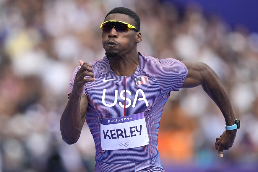 FILE - Fred Kerley, of the United States, competes in the men&#039;s 100-meter heats at the 2024 Summer Olympics, Saturday, Aug. 3, 2024, in Saint-Denis, France. (AP Photo/Matthias Schrader, File)