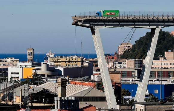FILE - A vehicle sits short of a section of the Morandi highway bridge that collapsed on Aug. 15, 2018, in Genoa, northern Italy. (AP Photo/Antonio Calanni, File)
Italy Bridge Collapse Trial