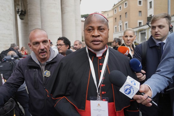Cardinal Fridolin Ambongo Besungu arrives at the Vatican, Monday, May 5, 2025, to attend the General Congregation of cardinals in the New Synod Hall where they are preparing for the upcoming conclave  ...