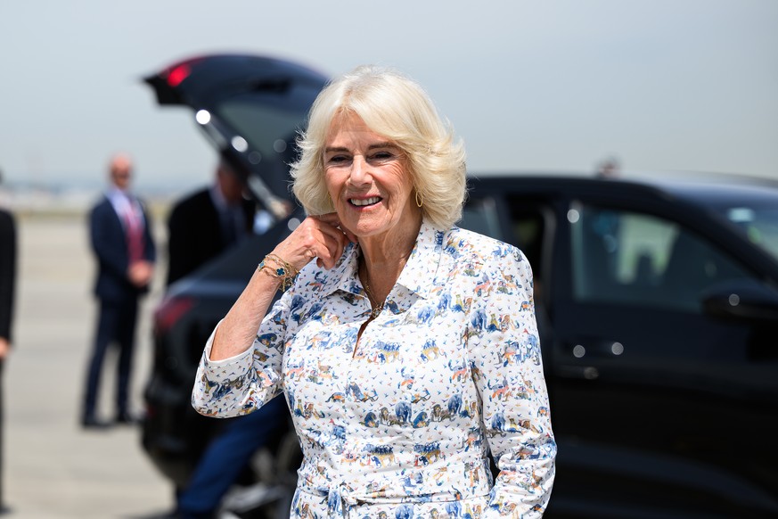 epa11676505 Britain&#039;s Queen Camilla is seen during her official departure from Australia at Sydney Kingsford Smith Airport in Sydney, Australia, 23 October 2024. King Charles III and Queen Camill ...