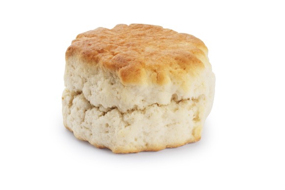 Studio shot of traditionally baked home scone cut out against a white background