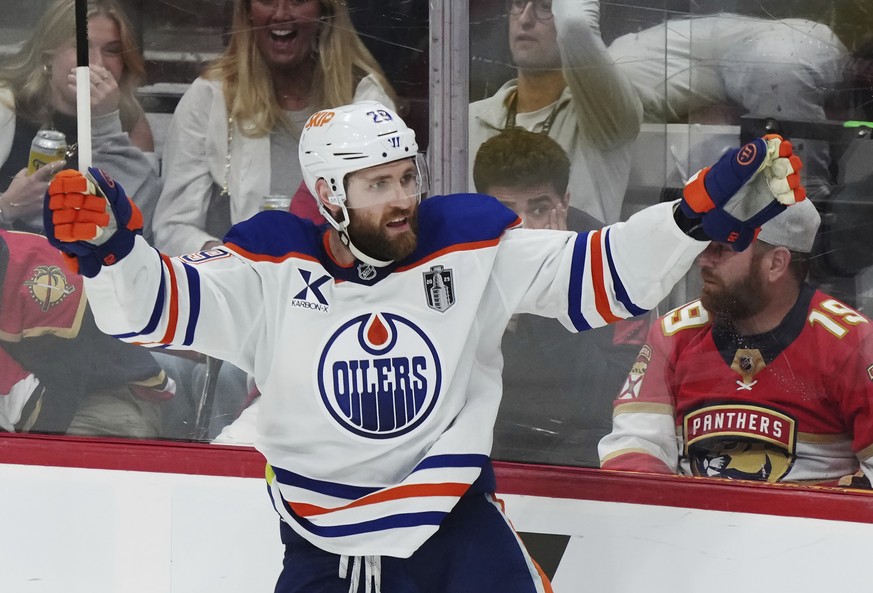 Edmonton Oilers&#039; Leon Draisaitl (29) celebrates after his winning goal against the Florida Panthers during the first overtime period in Game 4 of the NHL hockey Stanley Cup Final in Sunrise, Fla. ...