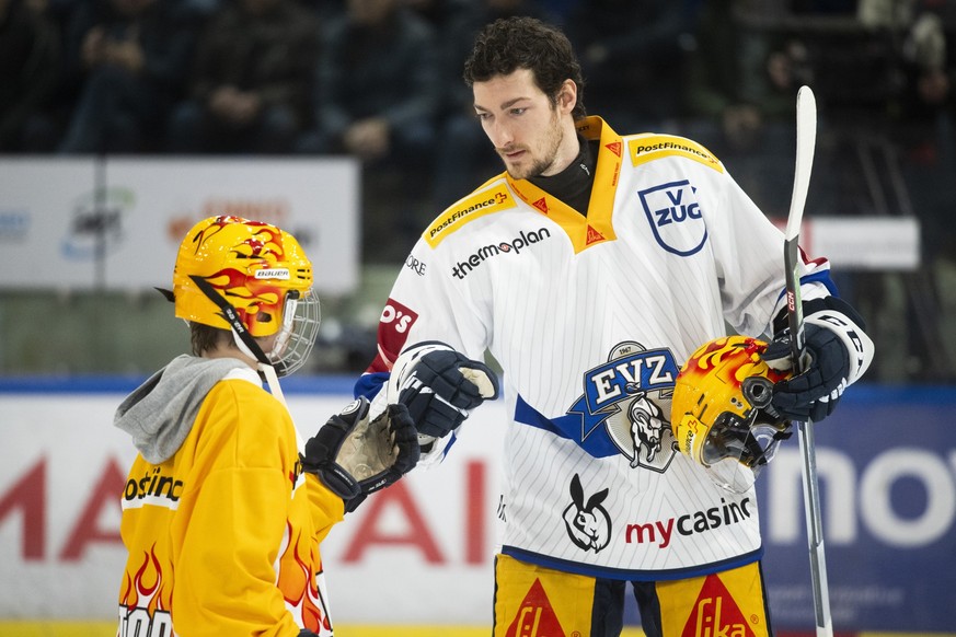 Zug's Postfinance Top Scorer Fabrice Herzog, during the match of National League A (NLA) Swiss Championship 2023/24 between HC Ambri Piotta and EV Zug at the ice stadium Gottardo Arena, Switzerla ...