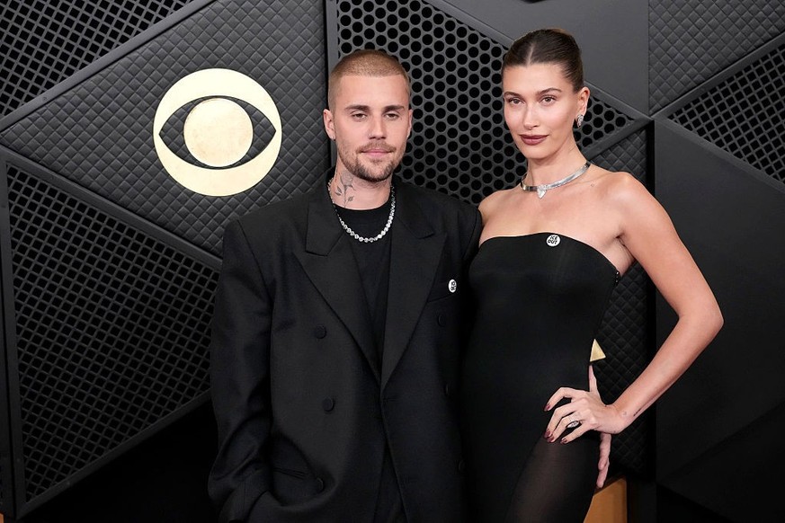 LOS ANGELES, CALIFORNIA - FEBRUARY 01: (FOR EDITORIAL USE ONLY) (L-R) Justin Bieber and Hailey Bieber attend the 68th GRAMMY Awards at Crypto.com Arena on February 01, 2026 in Los Angeles, California. ...
