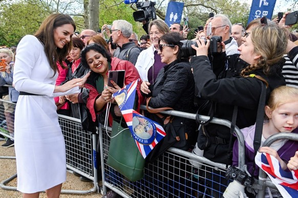 LONDON, ENGLAND - MAY 05: Catherine, Princess of Wales, meets well-wishers during a walkabout on the Mall outside Buckingham Palace ahead of the coronation of Britain&#039;s King Charles and Camilla,  ...