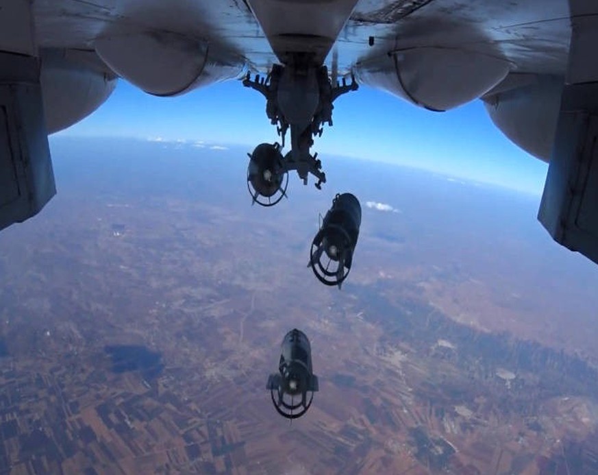 Russian Aerospace Forces conduct pinpoint air strikes on armored vehicles, fuel and lubrication materials storages 2719435 15.10.2015 A Russian Aerospace Defense Force jet bombs Islamic State faciliti ...