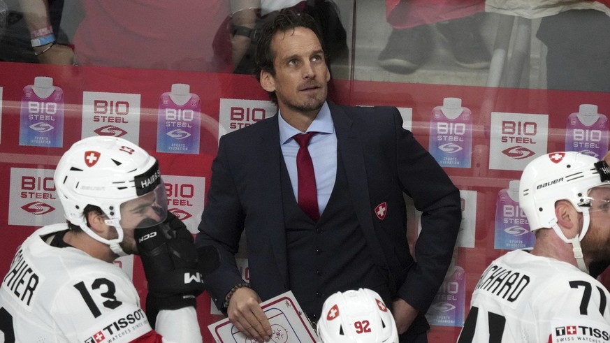 Head coach Patrick Fischer of Switzerland reacts during the group B match between Switzerland and Canada at the ice hockey world championship in Riga, Latvia, Saturday, May 20, 2023. (AP Photo/Roman K ...