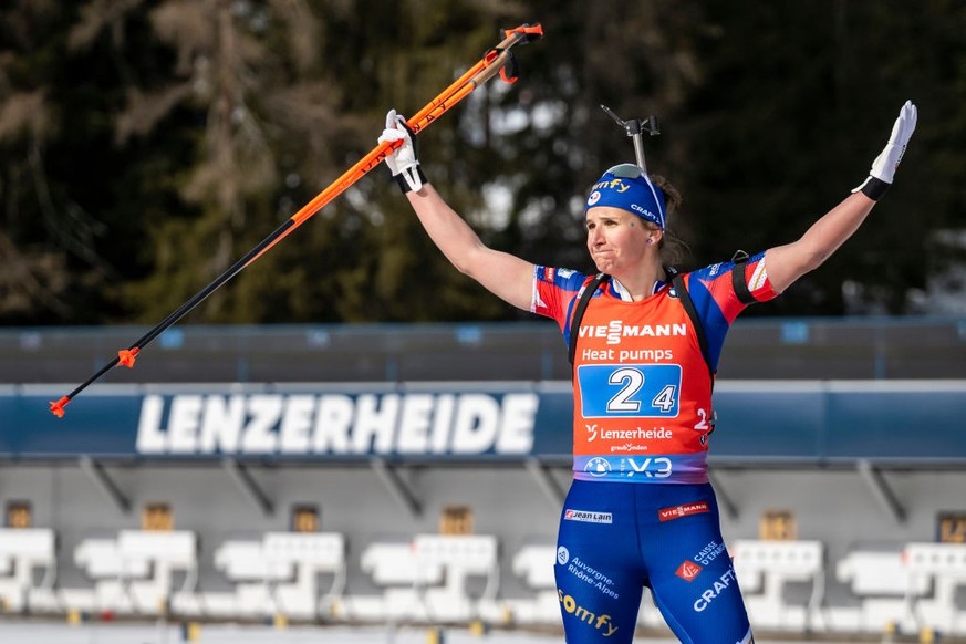LENZERHEIDE, SWITZERLAND - FEBRUARY 22: Julia Simon of France celebrates after her last shooting at the shooting range for winning the Women 4x6 km Relay at the IBU World Championships Biathlon Lenzer ...