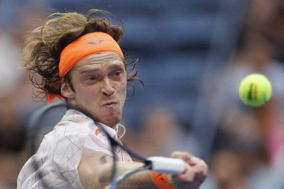 epa10845239 Andrey Rublev of Russia returns the ball to Daniil Medvedev of Russia during their quarter final match at the US Open Tennis Championships at the USTA National Tennis Center in Flushing Me ...