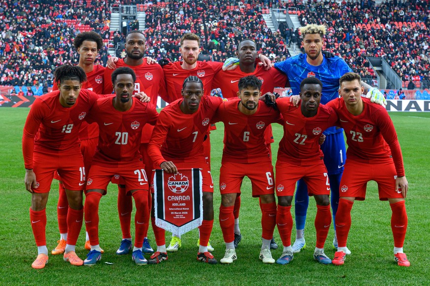BMO FIELD, TORONTO, ONTARIO, CANADA - 2026/03/28: Tani Oluwaseyi #12, Ali Ahmed #20, Jonathan David #7, Mathieu Choiniere #6, Richie Laryea #22, Niko Sigur #23 of Canada pose for a team photo during t ...