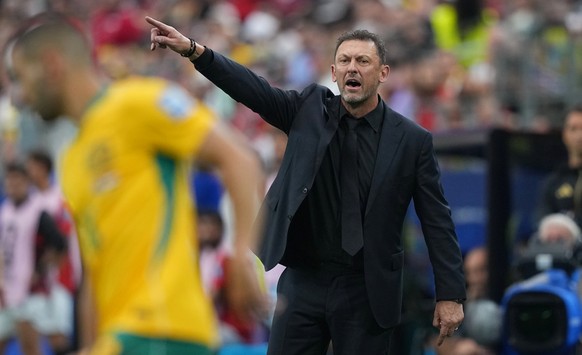Australia head coach Tony Popovic instructs his players during a World Cup round of 32 soccer match against Egypt in Arlington, Texas, near Dallas, Friday, July 3, 2026. (AP Photo/Julio Cortez)
Tony P ...