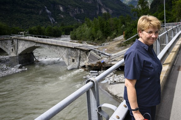 Swiss Federal President Viola Amherd visits the collapsed Visletto bridge between Visletto and Cevio, in the Maggia Valley during a visit of regions hit by bad weather, in Visletto, Switzerland, Monda ...