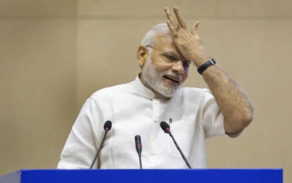 Indian Prime Minister Narendra Modi, gestures during his speech at a two day conference on India sanitation in New Delhi, India, Friday, Sept. 30, 2016. (AP Photo/Manish Swarup)