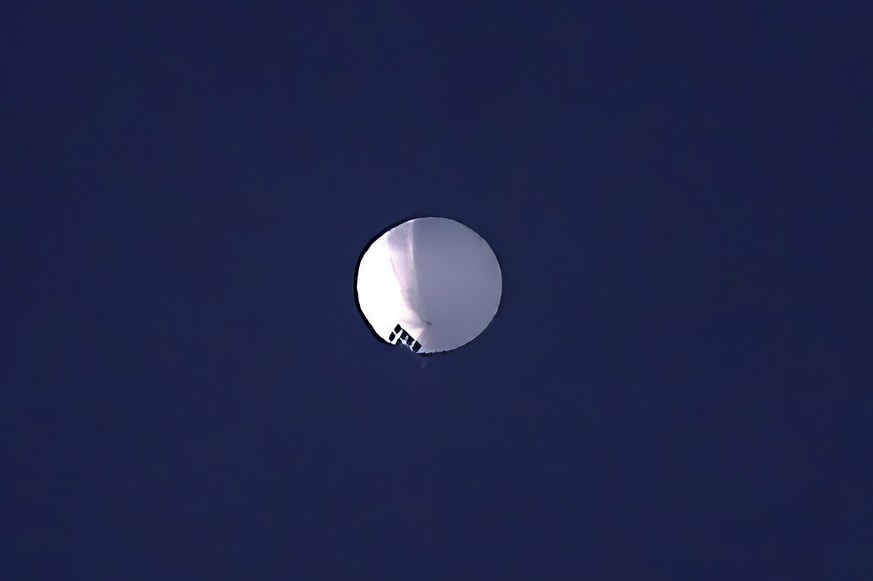 A high altitude balloon floats over Billings, Mont., on Wednesday, Feb. 1, 2023. The U.S. is tracking a suspected Chinese surveillance balloon that has been spotted over U.S. airspace for a couple day ...