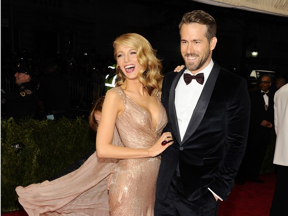 Blake Lively and Ryan Reynolds attend The Metropolitan Museum of Art&#039;s Costume Institute benefit gala celebrating &amp;quot;Charles James: Beyond Fashion&amp;quot; on Monday, May 5, 2014, in New  ...