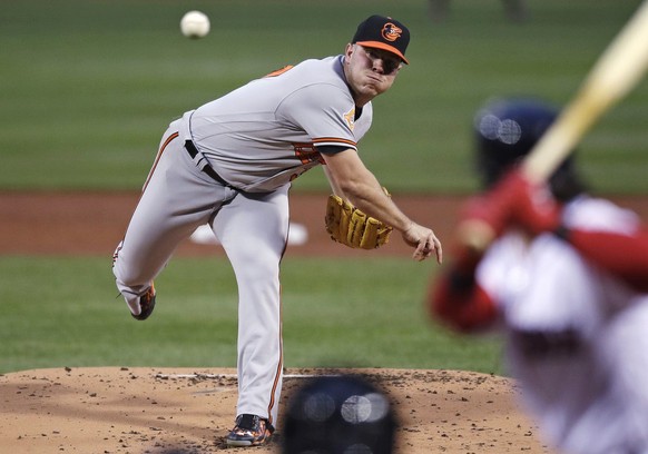 Baltimore Orioles starting pitcher Dylan Bundy delivers during the first inning of a baseball game against the Boston Red Sox at Fenway Park in Boston, Monday, May 1, 2017. (AP Photo/Charles Krupa)
