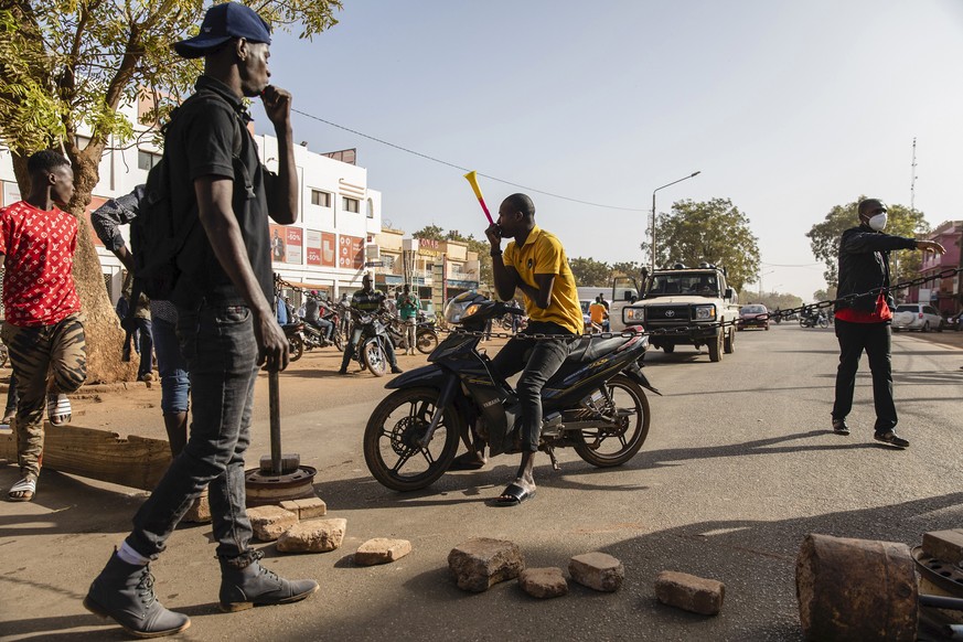 Protestors take to the streets of Burkina Faso&#039;s capital Ouagadougou Saturday Jan. 22, 2022, 27, 2021, protesting the government&#039;s inability to stop jihadist attacks spreading across the cou ...