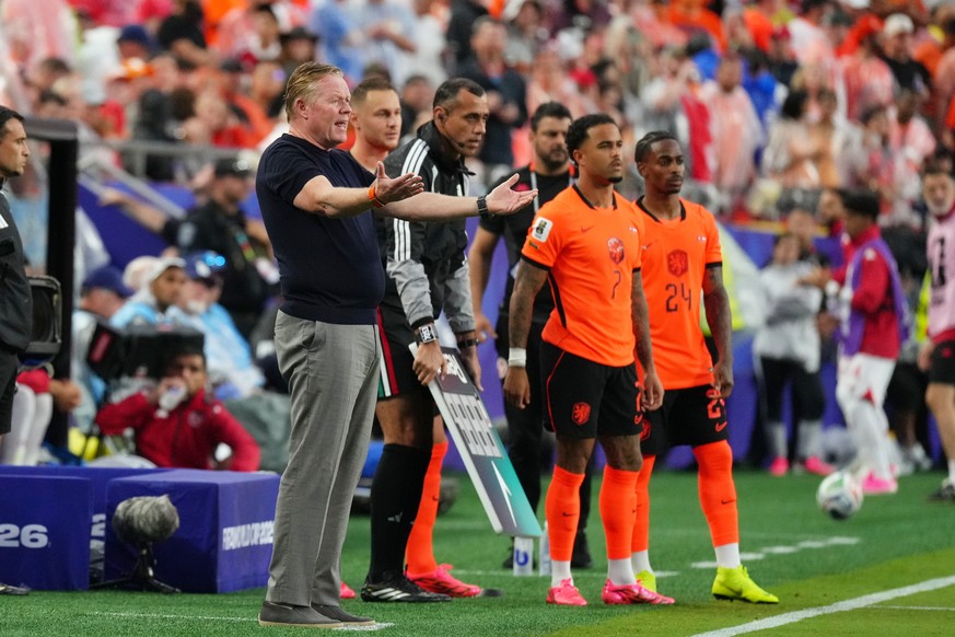 Netherlands head coach Ronald Koeman gestures during the World Cup Group F soccer match between Tunisia and the Netherlands in Kansas City, Mo., Thursday, June 25, 2026. (AP Photo/Ed Zurga)
Netherland ...