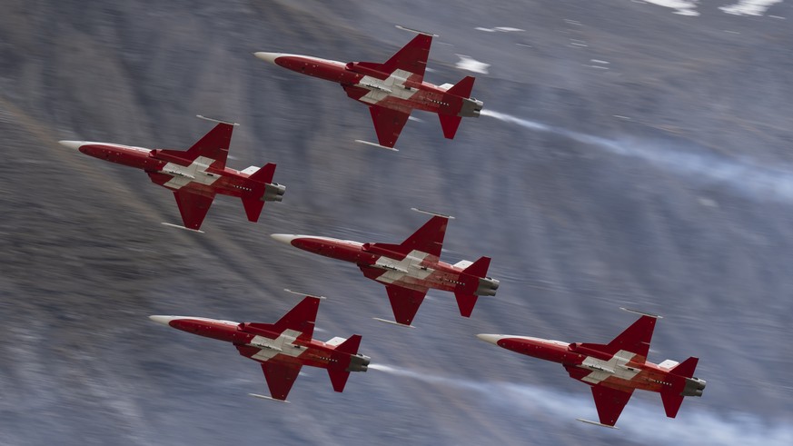 Tiger F5 airplanes from the Patrouille Suisse perform during the annual airshow of the Swiss Army in the Axalp area near Meiringen, Canton of Berne, Switzerland, on Thursday, October 20, 2022. (KEYSTO ...