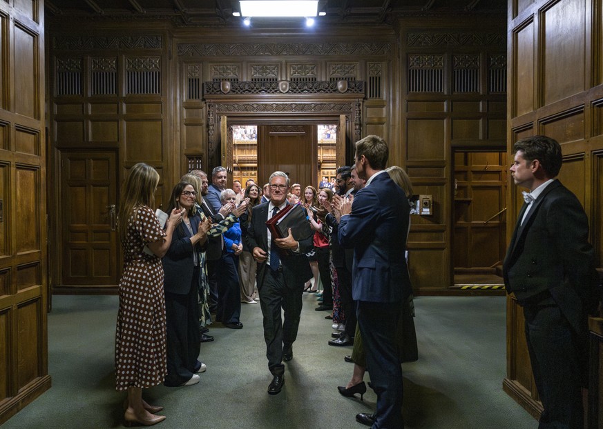 epa13113161 A handout photo made available by the House of Commons of British Prime Minister Keir Starmer being applauded as he leavies his final Prime Minister's Questions before he steps down a ...