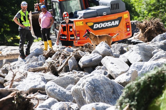 Cleanup work is underway at the Sorte village, community of Lostallo, Southern Switzerland, after a landslide, caused by the bad weather and heavy rain in the Misox valley, in Lostallo, Southern Switz ...