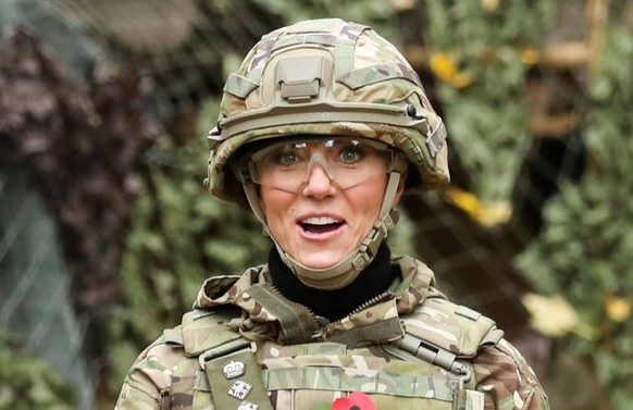 DEREHAM, ENGLAND - NOVEMBER 8: Catherine, Princess of Wales flies a drone as she visits The Queen's Dragoon Guards Regiment for the first time as their Colonel in Chief on November 8, 2023 in Der ...