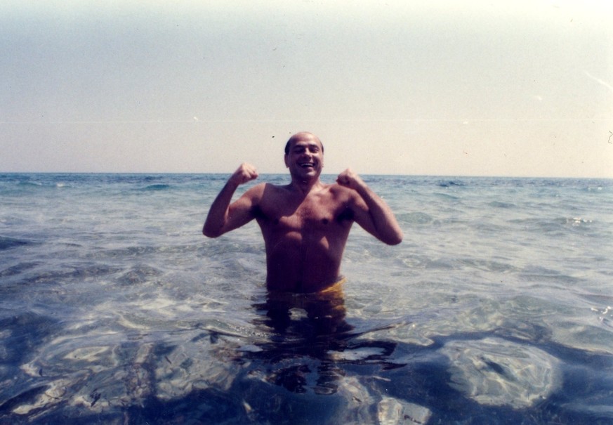 Silvio Berlusconi at the beach in Hammamet in Tunisia in August 1984. He was at the beach with Bettino Craxi and Fedele Confalonieri. (Photo by Umberto Cicconi/Getty Images)