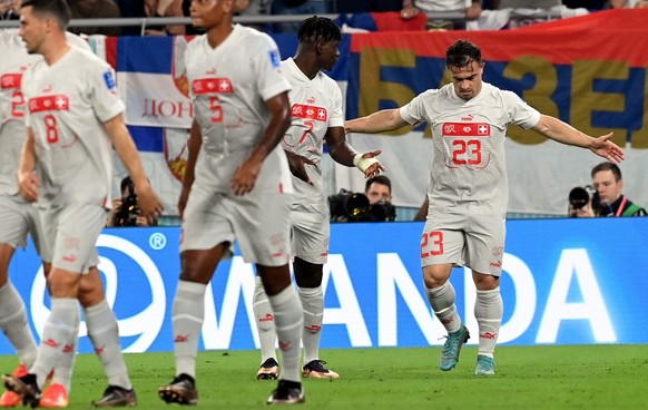 epa10345017 Xherdan Shaqiri of Switzerland (R) celebrates after scoring the 1-0 during the FIFA World Cup 2022 group G soccer match between Serbia and Switzerland at Stadium 947 in Doha, Qatar, 02 Dec ...