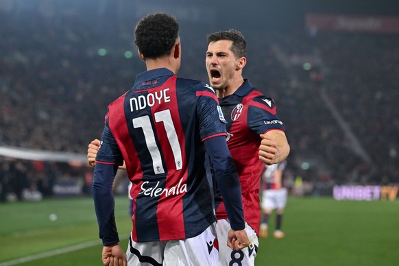 Bologna FC s midfielder Remo Freuler celebrates with Bologna FC s forward Dan Ndoye during Bologna FC vs ACF Fiorentina, Italian soccer Serie A match in Bologna, Italy, February 14 2024 PUBLICATIONxNO ...