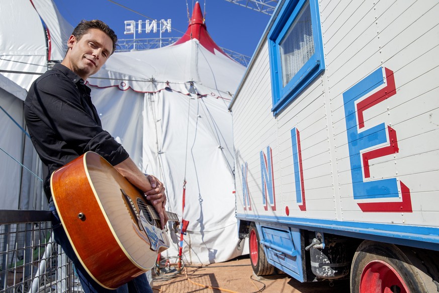 Swiss singer Bastian Baker poses for the photographer prior the show entitled &quot;Knie withe Bastian Baker&quot; of the Swiss national circus Knie, in Geneva, Switzerland, Friday, August 27, 2021. T ...