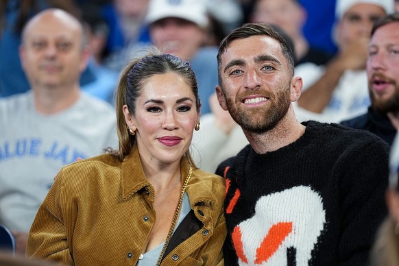 TORONTO, ON - OCTOBER 25: Ashley Herron and Matt Turner pose for a photo during Game Two of the 2025 World Series presented by Capital One between the Los Angeles Dodgers and the Toronto Blue Jays at  ...