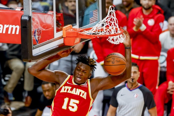 epa09834943 Atlanta Hawks center Clint Capela of Switzerland reacts after make a dunk against the Memphis Grizzlies during the second half of the NBA basketball game between the Memphis Grizzlies and  ...