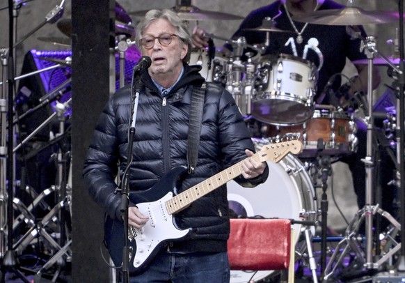 Musician Eric Clapton performs at the Waldbuhne, in Berlin, Sunday, May 29, 2022. (Britta Pedersen/dpa via AP)