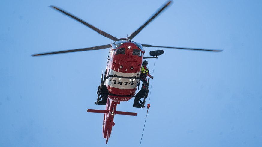 The new Airbus H 145 D3 based at the REGA base in Magadino in flight, during the REGA exercise involving the evacuation of the Monte Tamaro cable car, Rivera, Wednesday 18 March 2026..(KEYSTONE/Ti-Pre ...